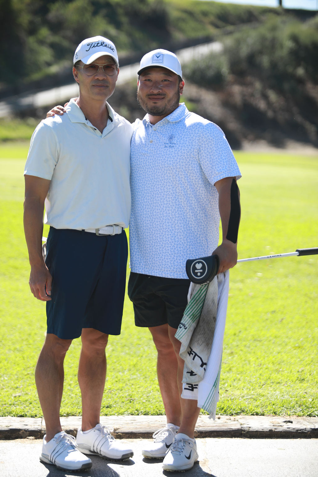 Two players posing together on the course